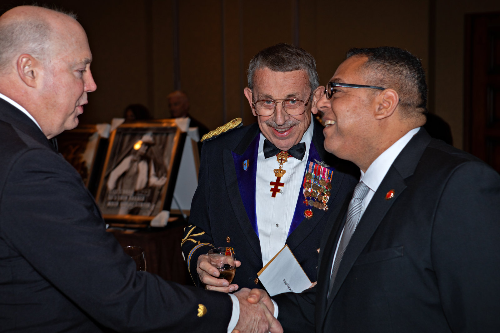 Guests greeting one another in the gala ballroom