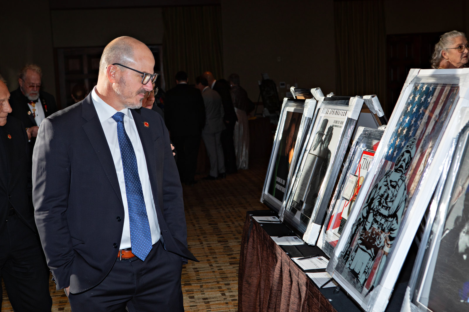 A guest browsing artwork offered at the Templar Gala auction