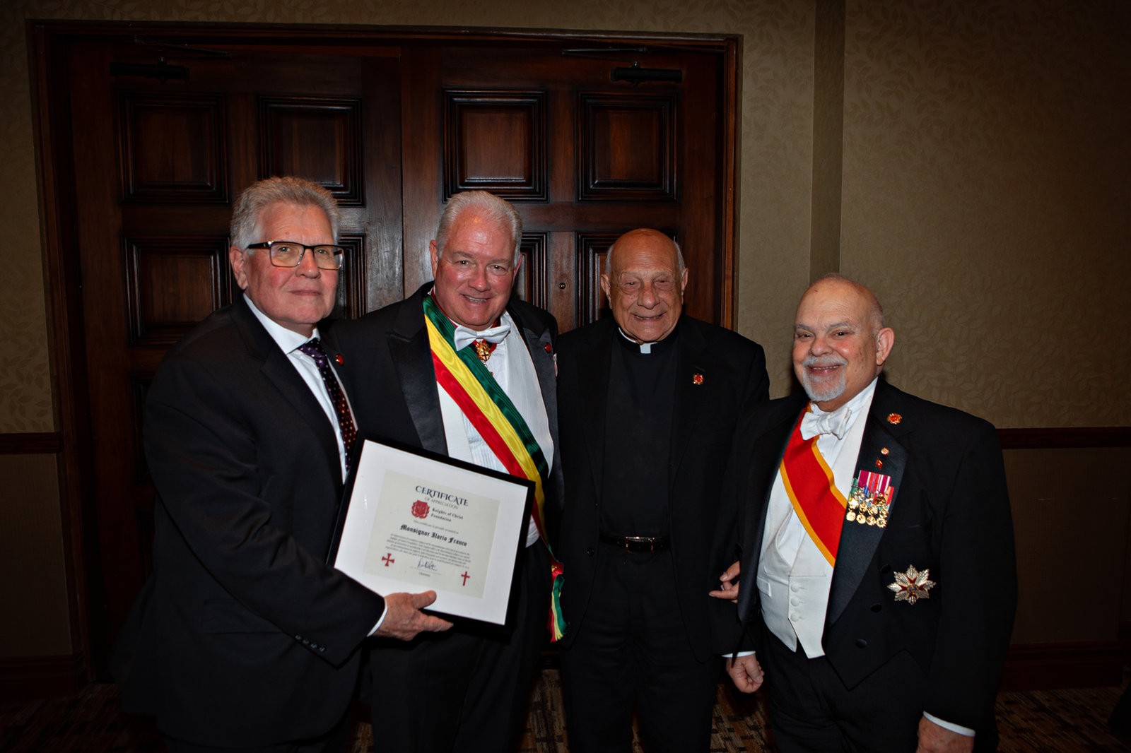 Knights of Christ Foundation members with an award recipient at the Templar Gala